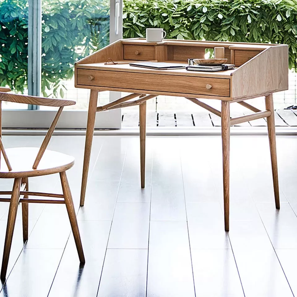 Ercol furniture can cater for your home office or provide a stylish workspace in your living room or bedroom. Their range of desks combine beautiful timber and style with lots of practical features - such as useful drawers and cut-outs for cables.
